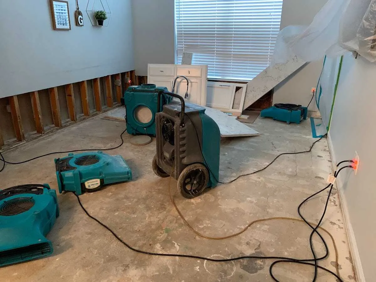 Dehumidifier in flood-cut room for Water Damage Restoration in Oxford